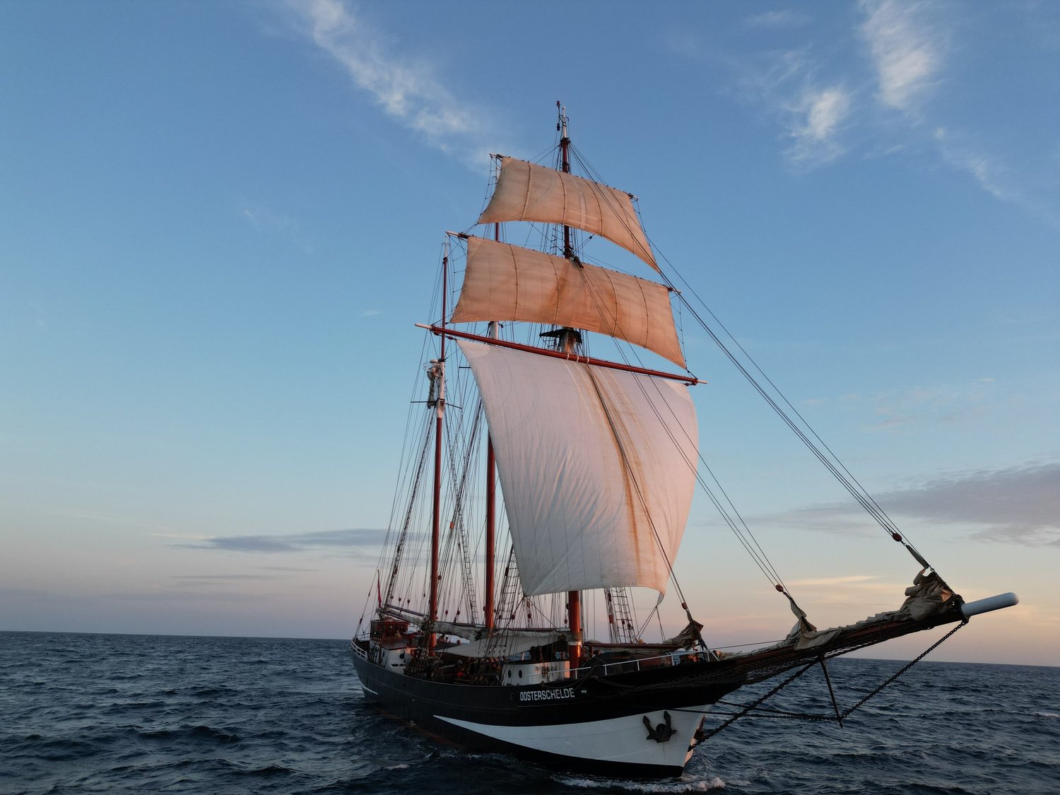 Three-masted Oosterschelde under sail at sea